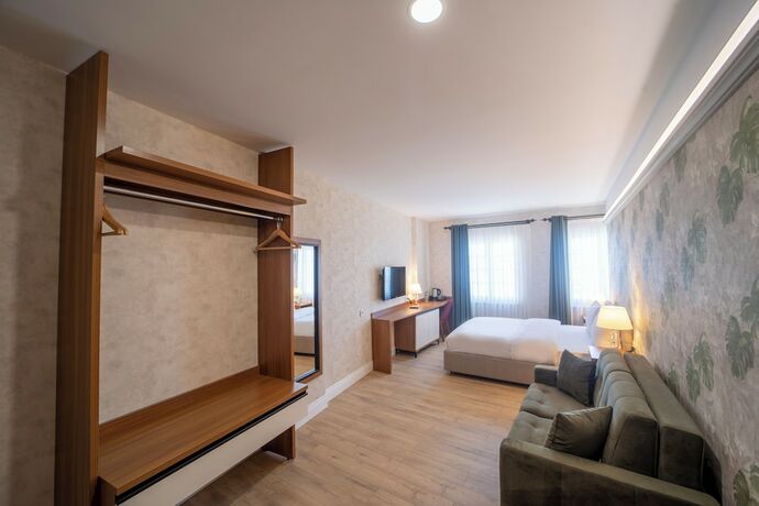 Imagen de la habitación del Mell City Suite Hotel. Foto 17