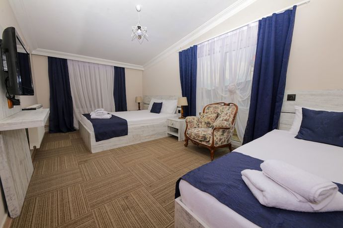 Imagen de la habitación del Melodi Butik Otel. Foto 12
