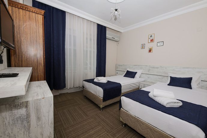 Imagen de la habitación del Melodi Butik Otel. Foto 13