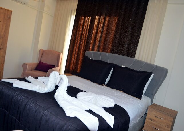 Imagen de la habitación del Menderes Butik Otel. Foto 12