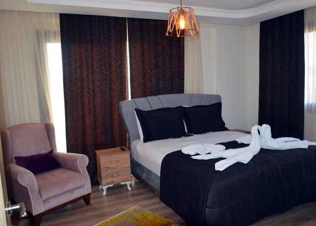 Imagen de la habitación del Menderes Butik Otel. Foto 13