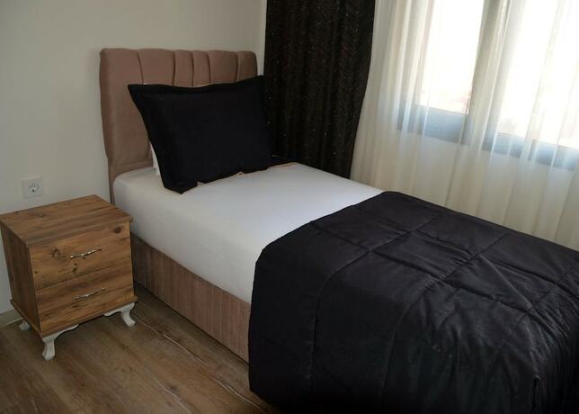 Imagen de la habitación del Menderes Butik Otel. Foto 14