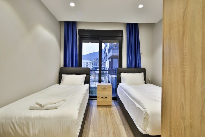 Imagen de la habitación del Mene Suites. Foto 3