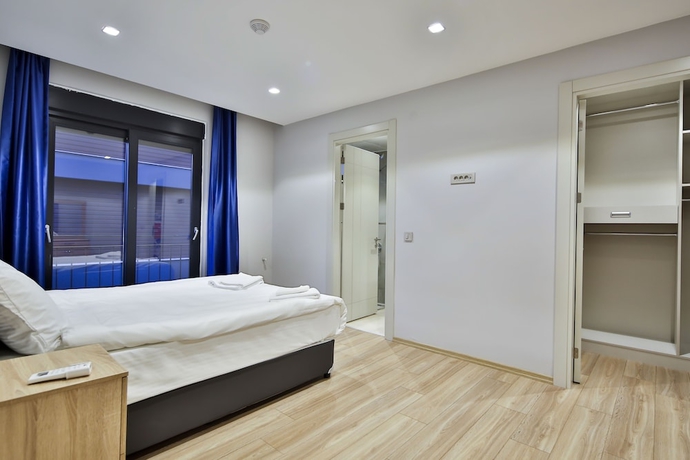 Imagen de la habitación del Mene Suites. Foto 7