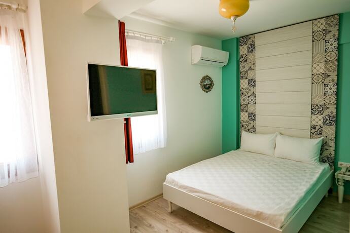 Imagen de la habitación del Menendi Otel. Foto 15