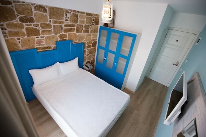 Imagen de la habitación del Menendi Otel. Foto 16