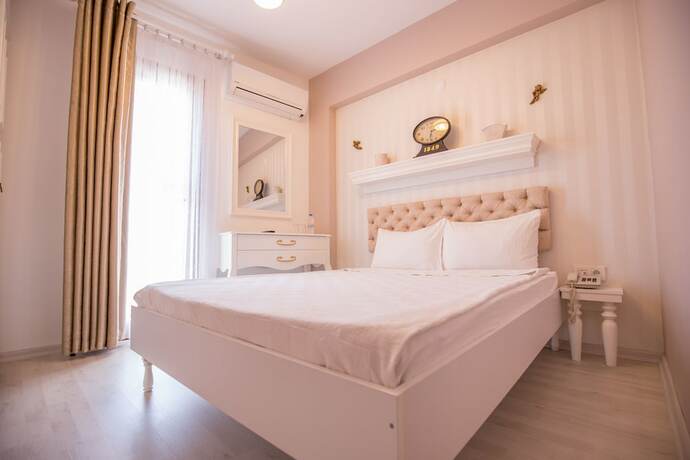 Imagen de la habitación del Menendi Otel. Foto 17