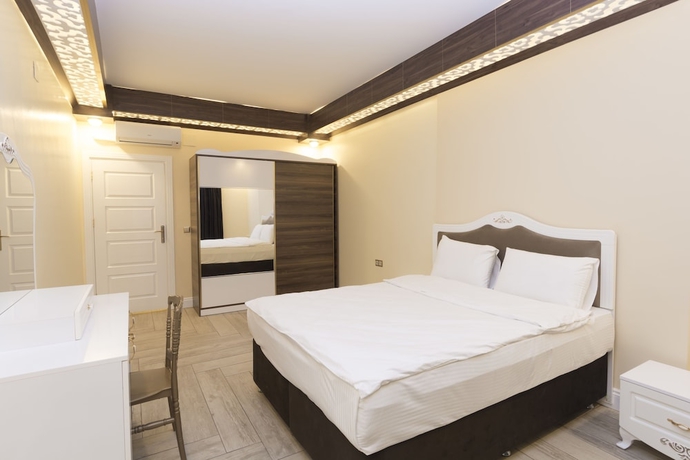 Imagen de la habitación del Merada Suit Otel. Foto 12