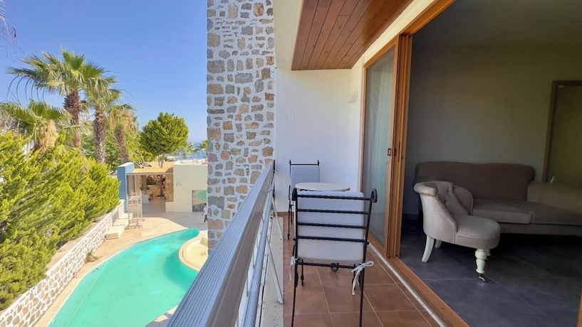 Imagen de la habitación del Mercans Bodrum Beach Hotel. Foto 11