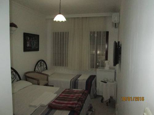 Imagen de la habitación del Merkez Kumsal Pansiyon. Foto 3