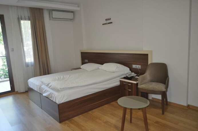 Imagen de la habitación del Merkez Otel, Konak. Foto 17