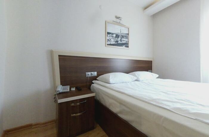 Imagen de la habitación del Merkez Otel, Konak. Foto 19