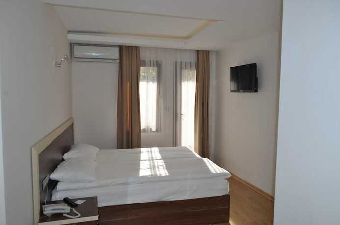 Imagen de la habitación del Merkez Otel, Konak. Foto 20