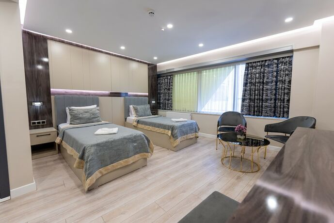 Imagen de la habitación del Meros Hotel. Foto 15