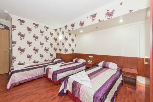 Imagen de la habitación del Metro Hotel. Foto 1