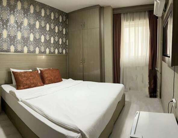 Imagen de la habitación del Metro Otel İzmir. Foto 9