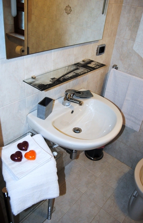 Imagen de la habitación del Metropolis Rooms and Services. Foto 12