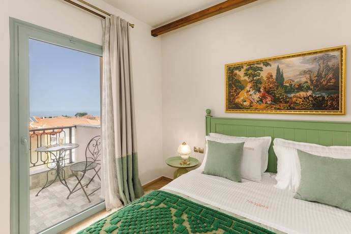 Imagen de la habitación del Meydani Suites. Foto 2