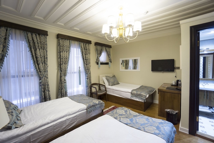 Imagen de la habitación del Mezzo Hotel. Foto 3