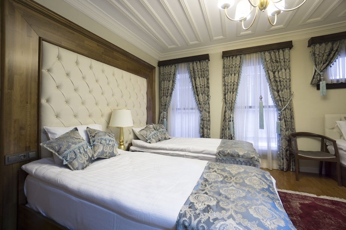 Imagen de la habitación del Mezzo Hotel. Foto 4