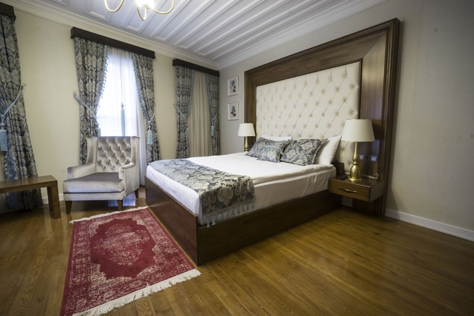 Imagen de la habitación del Mezzo Hotel. Foto 5