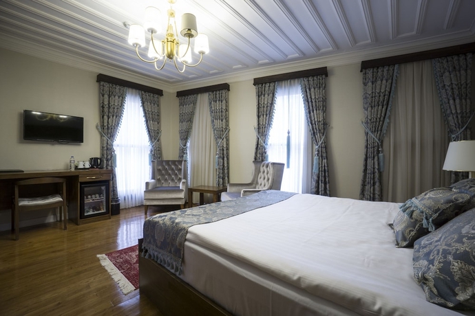 Imagen de la habitación del Mezzo Hotel. Foto 6