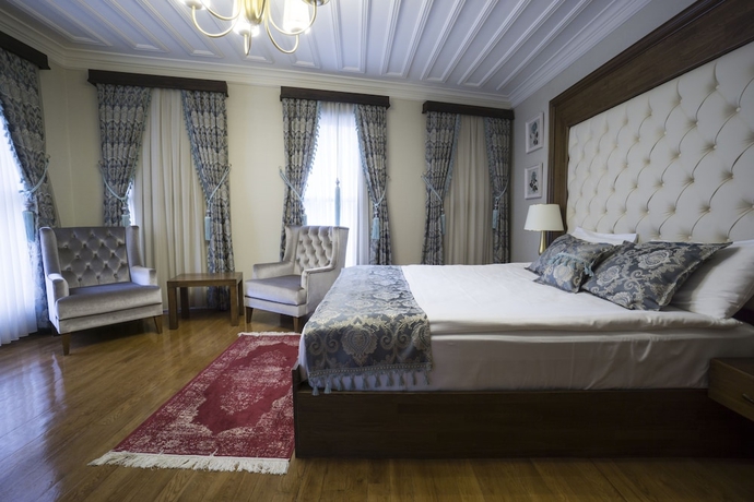 Imagen de la habitación del Mezzo Hotel. Foto 7