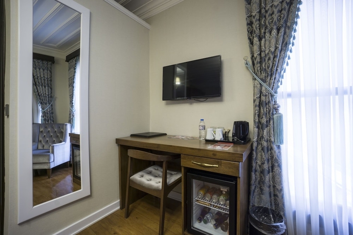 Imagen de la habitación del Mezzo Hotel. Foto 10