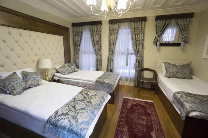 Imagen de la habitación del Mezzo Hotel. Foto 11