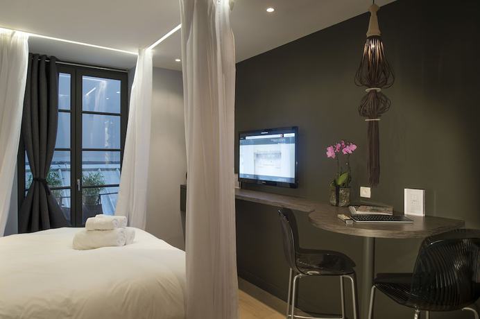 Imagen de la habitación del MiHotel, Lyon. Foto 17