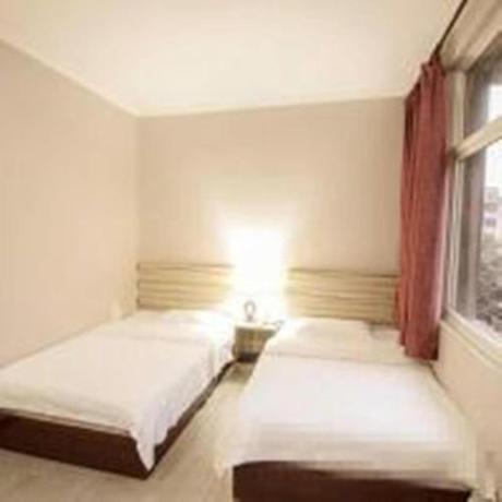 Imagen de la habitación del Mianyang Triumph Business Inn. Foto 5