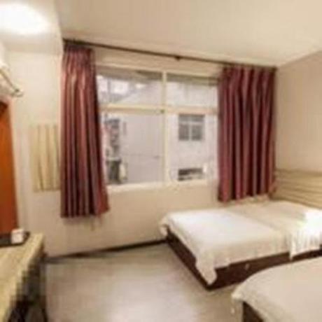 Imagen de la habitación del Mianyang Triumph Business Inn. Foto 8