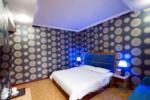 Imagen de la habitación del Mianyang Triumph Business Inn. Foto 9