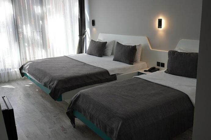 Imagen de la habitación del Midis Otel. Foto 18