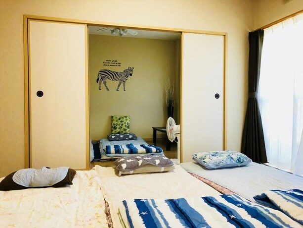 Imagen de la habitación del Midtown Sakura Apartment House 102. Foto 25