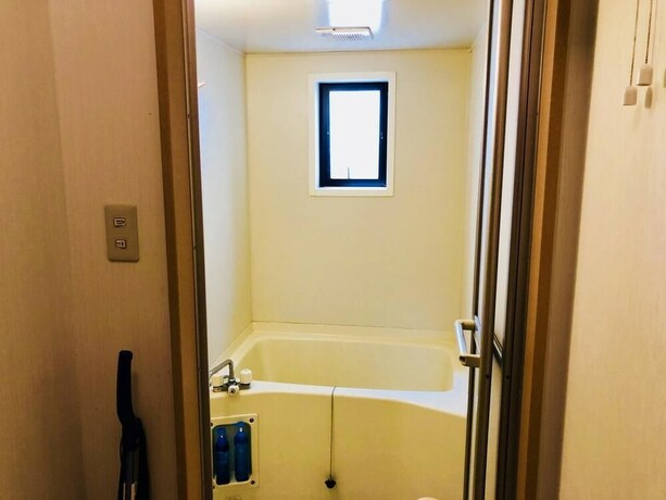 Imagen de la habitación del Midtown Sakura Apartment House 102. Foto 29