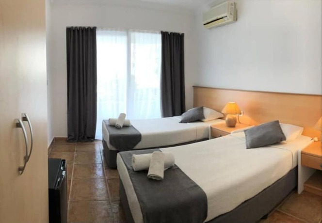 Imagen de la habitación del Mimosa Pension. Foto 19