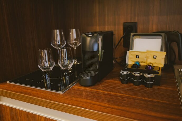 Imagen de la habitación del Mimosa Suites. Foto 14