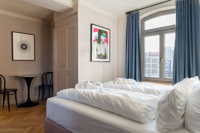 Imagen de la habitación del Mimosa Suites. Foto 17