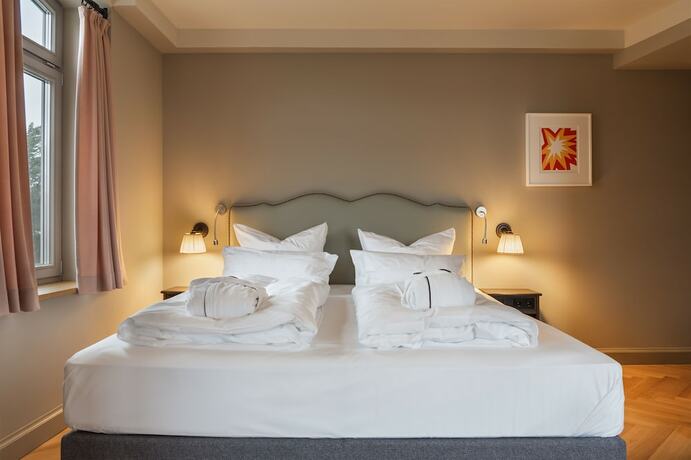 Imagen de la habitación del Mimosa Suites. Foto 19
