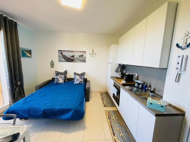 Imagen de la habitación del Mimose Beach Village. Foto 9