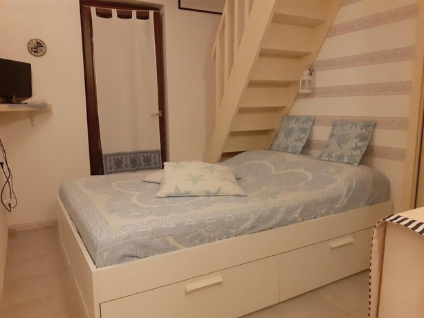 Imagen de la habitación del Mimose Beach Village. Foto 10