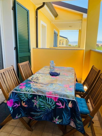 Imagen de la habitación del Mimose Beach Village. Foto 11