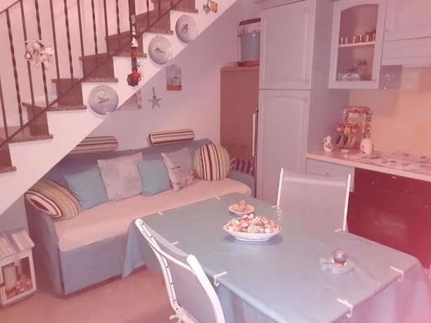 Imagen de la habitación del Mimose Beach Village. Foto 12