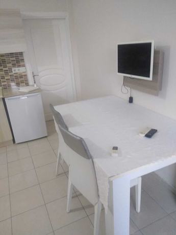 Imagen de la habitación del Mina Grand Hotel. Foto 18
