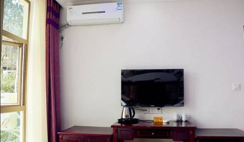 Imagen de la habitación del Mingxiuya Leisure Villa. Foto 6