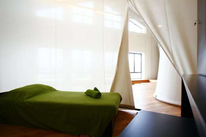 Imagen de la habitación del Mino - Migliarino Nuovo Ostello. Foto 17