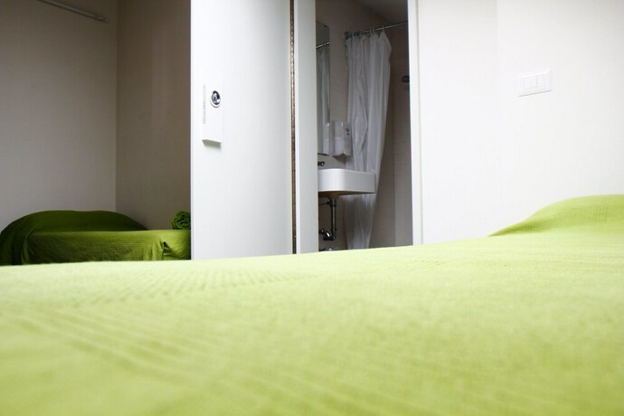 Imagen de la habitación del Mino - Migliarino Nuovo Ostello. Foto 18