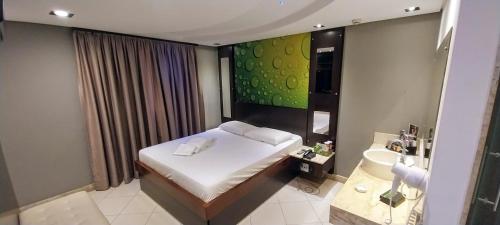 Imagen de la habitación del Mint Motel. Foto 16