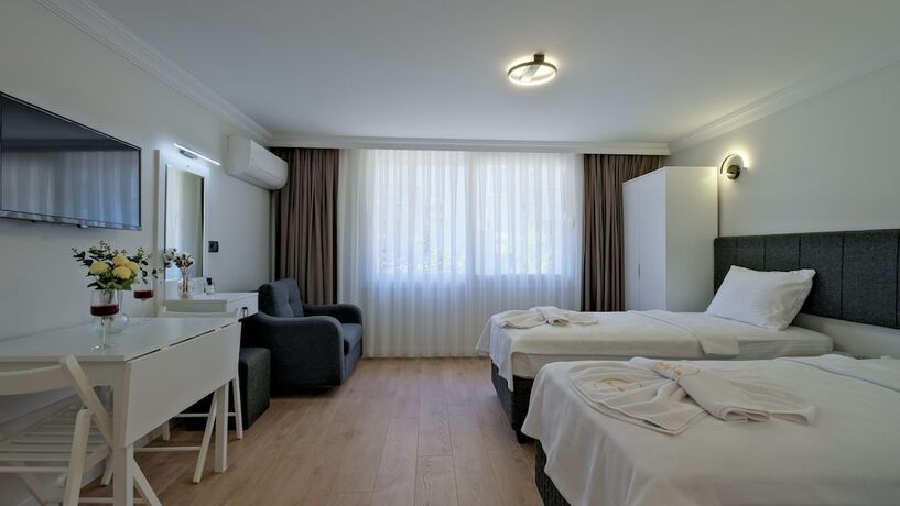 Imagen de la habitación del Miralya Suites. Foto 17